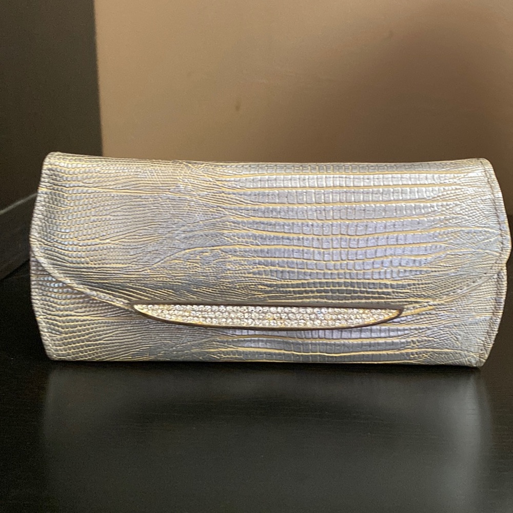 Judith Leiber Crystal Sunglass Case Silver/Gold
Crocodile Skin Leather Clutch